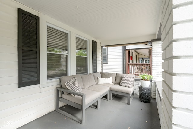 view of patio / terrace with covered porch and an outdoor living space