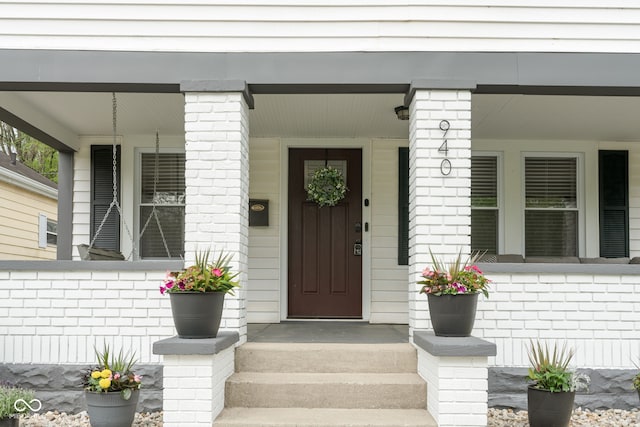 property entrance with a porch