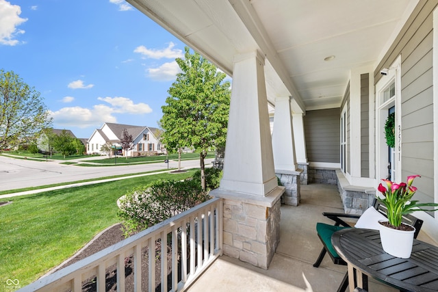 view of patio with a porch and a residential view
