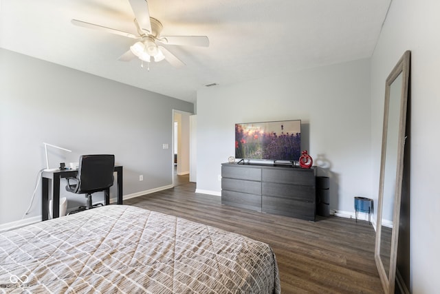 bedroom featuring baseboards, dark wood-style flooring, ceiling fan, and visible vents