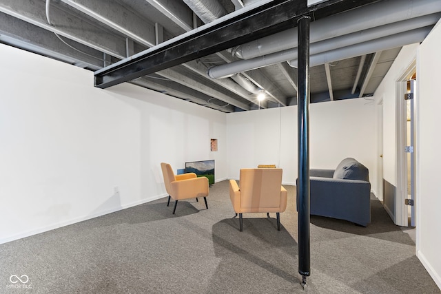 finished basement featuring carpet flooring