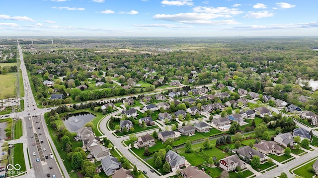 aerial view featuring a water view and a residential view