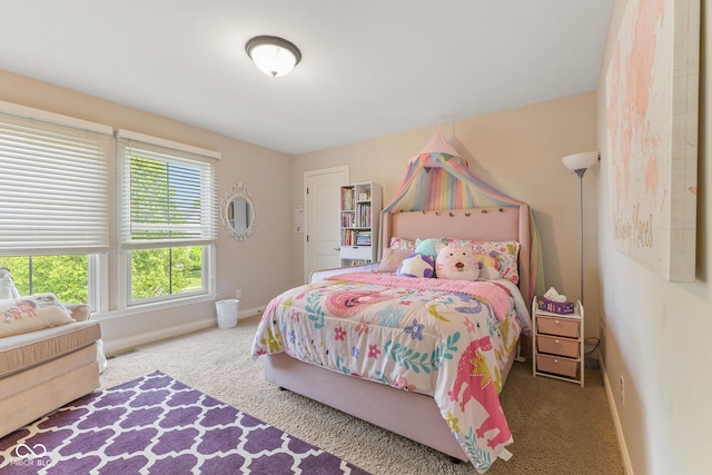 bedroom with baseboards, carpet, and visible vents