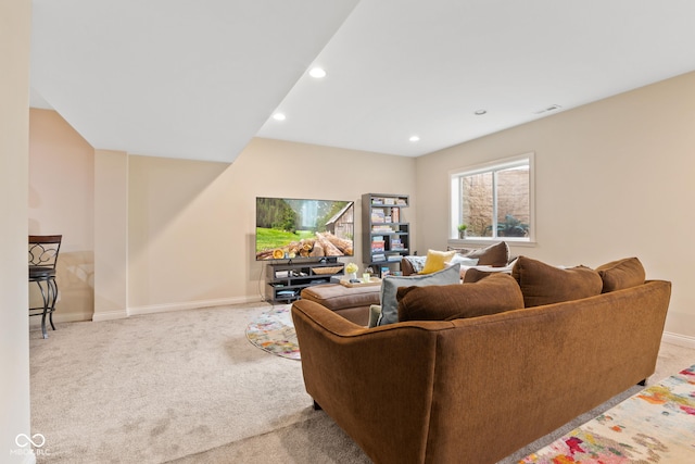 carpeted living room with baseboards and recessed lighting