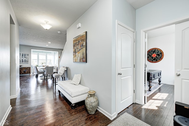 14584 Hinton Dr, Fishers, IN 46037 - hallway featuring dark wood finished floors and baseboards