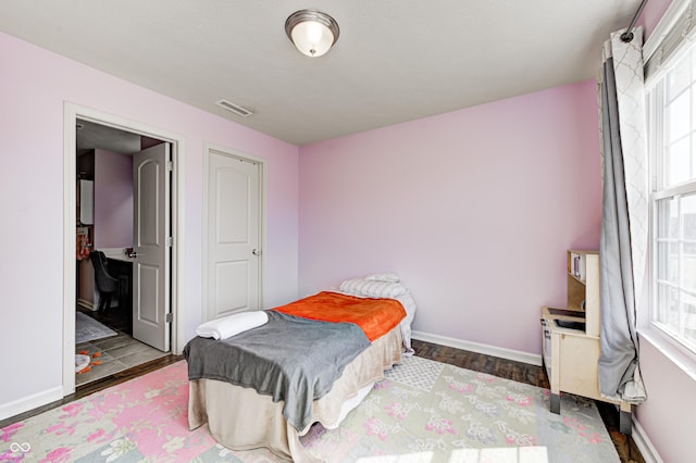14584 Hinton Dr, Fishers, IN 46037 - bedroom with baseboards and dark wood-style floors
