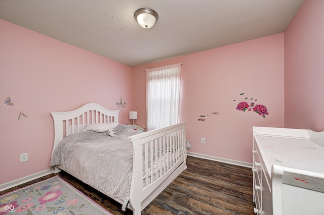 14584 Hinton Dr, Fishers, IN 46037 - bedroom with dark wood-style flooring and baseboards