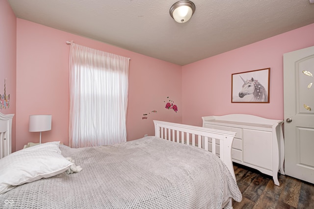 14584 Hinton Dr, Fishers, IN 46037 - bedroom with dark wood-style floors
