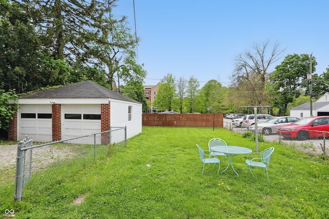 4730 Rookwood Ave, Indianapolis, IN 46208 - view of yard featuring fence, an outdoor structure, and a garage