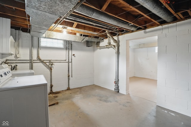 4730 Rookwood Ave, Indianapolis, IN 46208 - below grade area featuring washer / dryer and concrete block wall