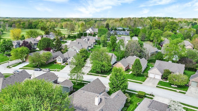 birds eye view of property with a residential view