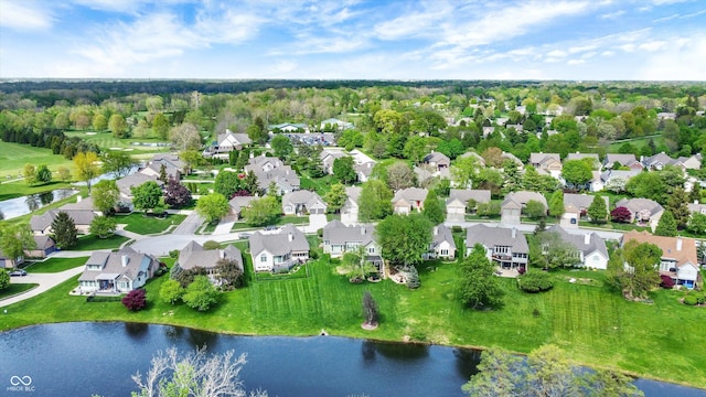 aerial view with a water view and a residential view