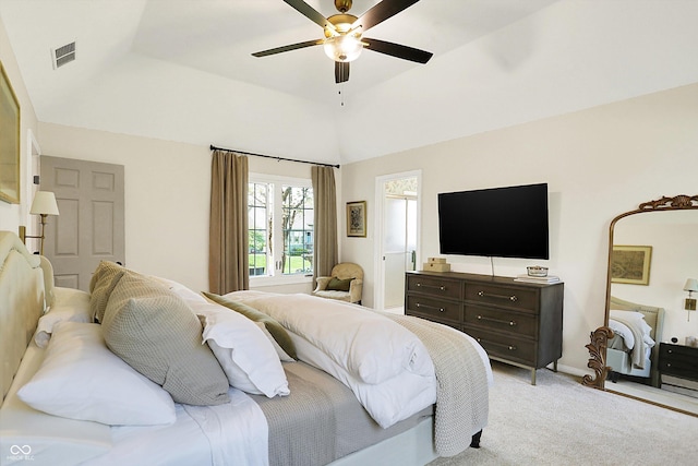 bedroom featuring a ceiling fan, visible vents, and light carpet