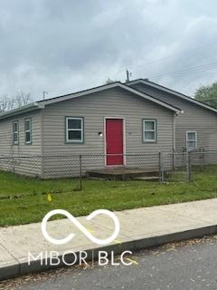 1710 S Birch St, Muncie, IN 47302 - view of front of house featuring a front lawn and fence