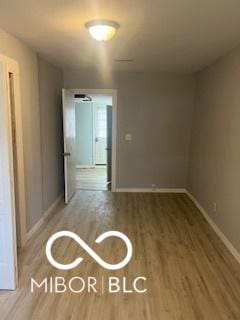 1710 S Birch St, Muncie, IN 47302 - unfurnished room featuring baseboards and wood finished floors