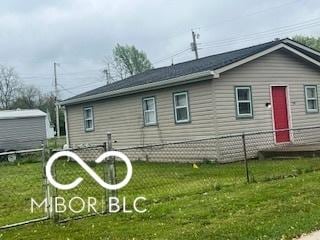 1710 S Birch St, Muncie, IN 47302 - rear view of property with a yard and fence