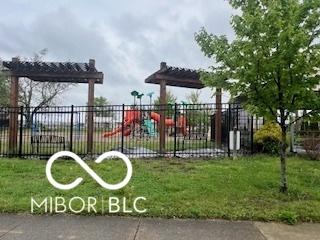 1710 S Birch St, Muncie, IN 47302 - view of playground featuring fence and a lawn