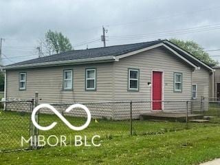1710 S Birch St, Muncie, IN 47302 - rear view of house featuring a yard and fence