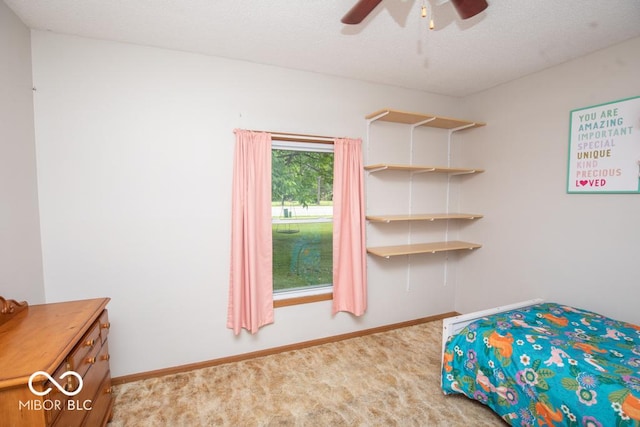 5340 N State Highway 7, North Vernon, IN 47265 - unfurnished bedroom with carpet floors, baseboards, and ceiling fan