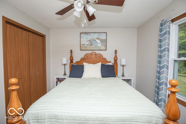 5340 N State Highway 7, North Vernon, IN 47265 - bedroom with a closet, ceiling fan, and a textured ceiling