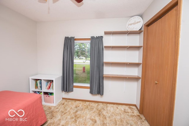 5340 N State Highway 7, North Vernon, IN 47265 - unfurnished bedroom with carpet, baseboards, and a ceiling fan