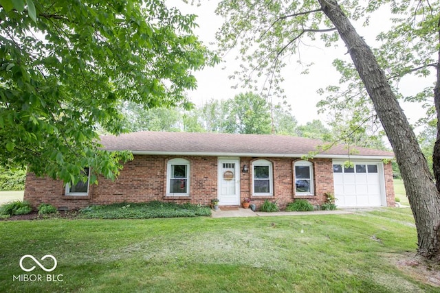 5340 N State Highway 7, North Vernon, IN 47265 - ranch-style home with a garage, a front lawn, and brick siding