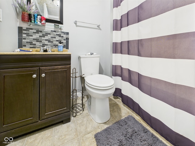 full bath featuring vanity, decorative backsplash, toilet, tile patterned floors, and a shower with curtain