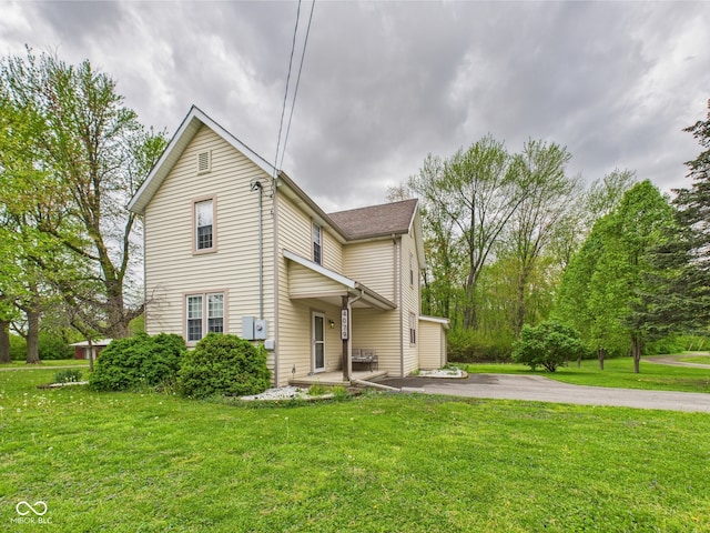 exterior space with a lawn