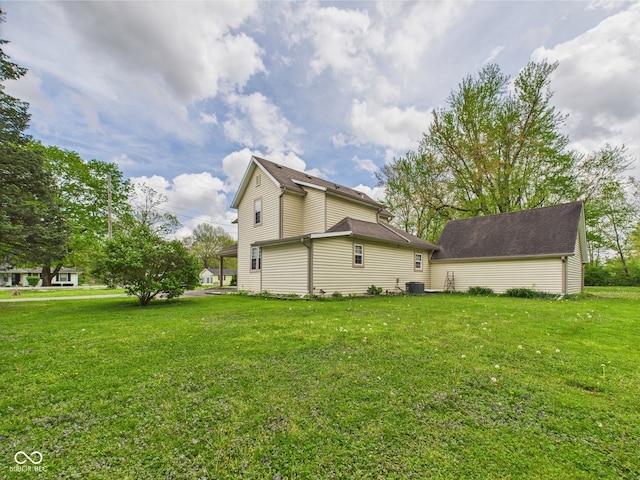 view of home's exterior with a yard