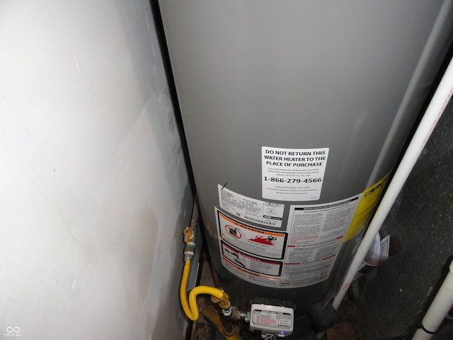 3426 Ireland Dr, Indianapolis, IN 46235 - exterior details with gas water heater