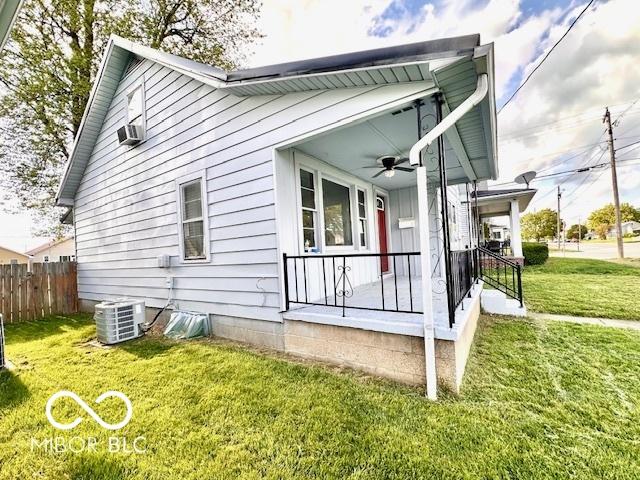 1045 13th St, Tell City, IN 47586 - view of side of property with cooling unit and ceiling fan