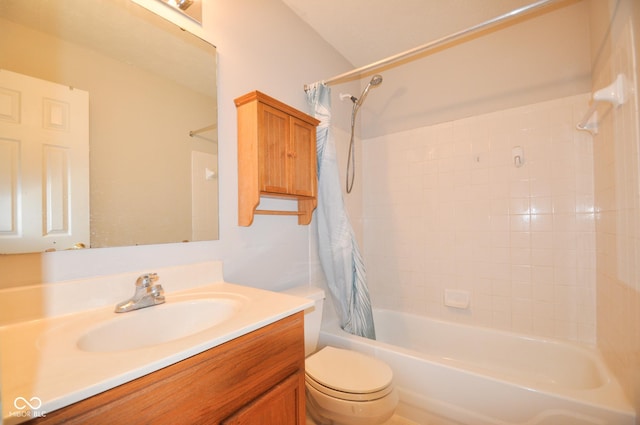 full bathroom with vanity, toilet, and shower / tub combo