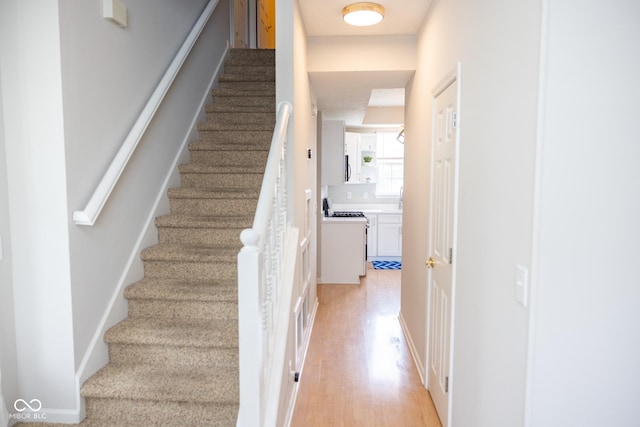 9718 Jupiter Pass, Carmel, IN 46032 - stairs with wood finished floors