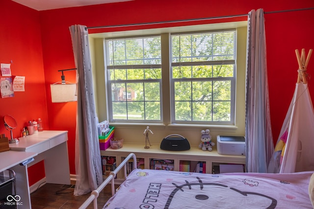 9718 Jupiter Pass, Carmel, IN 46032 - bedroom featuring multiple windows and dark wood-style flooring