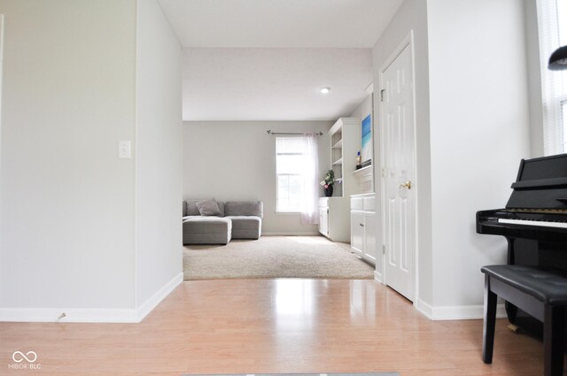 9718 Jupiter Pass, Carmel, IN 46032 - living area featuring baseboards and wood finished floors