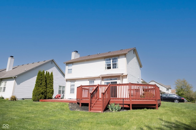 9718 Jupiter Pass, Carmel, IN 46032 - rear view of property featuring a wooden deck, a yard, and a chimney