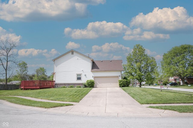 9718 Jupiter Pass, Carmel, IN 46032 - view of front of home featuring a garage, driveway, a front lawn, and a deck