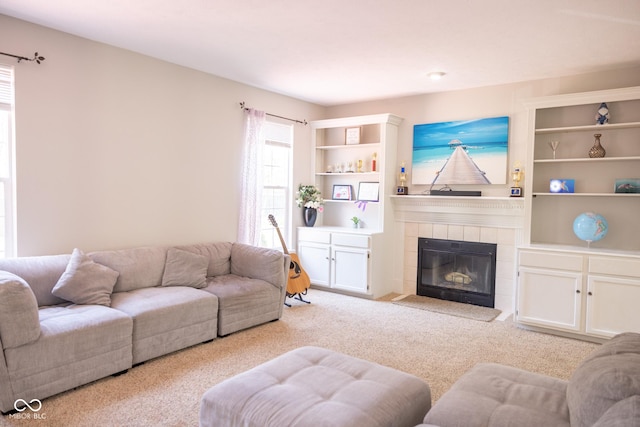 9718 Jupiter Pass, Carmel, IN 46032 - carpeted living area featuring a tiled fireplace and built in features