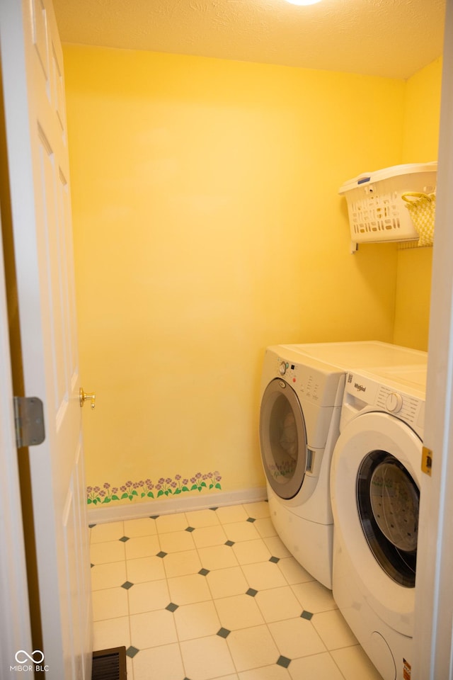 9718 Jupiter Pass, Carmel, IN 46032 - washroom featuring washer and dryer and baseboards