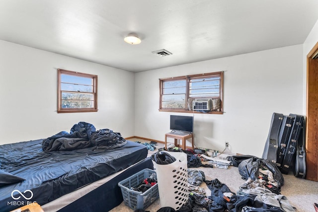 3200 Raible Ave, Anderson, IN 46011 - bedroom with carpet flooring, multiple windows, visible vents, and cooling unit
