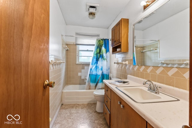 3200 Raible Ave, Anderson, IN 46011 - full bathroom featuring toilet, tile walls, visible vents, shower / bathtub combination with curtain, and vanity
