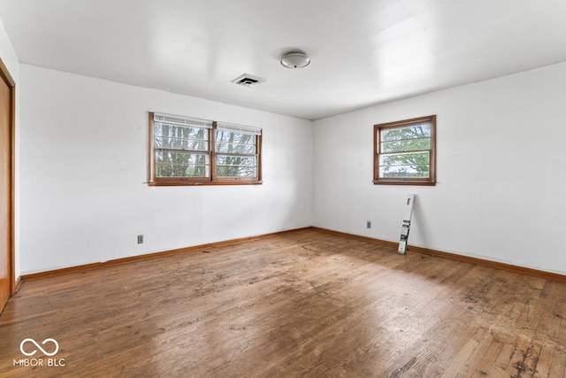 3200 Raible Ave, Anderson, IN 46011 - empty room featuring visible vents, baseboards, and hardwood / wood-style flooring