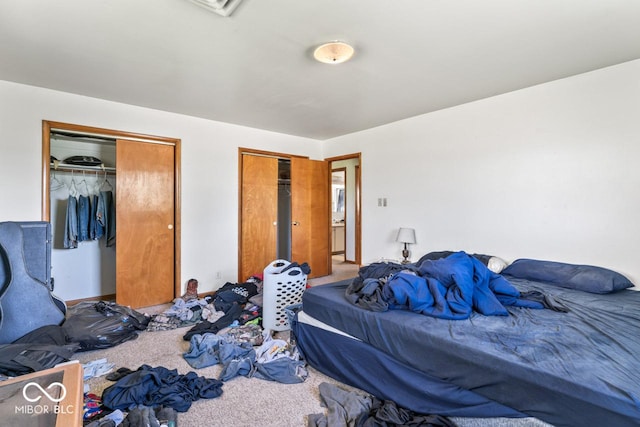 3200 Raible Ave, Anderson, IN 46011 - carpeted bedroom featuring two closets