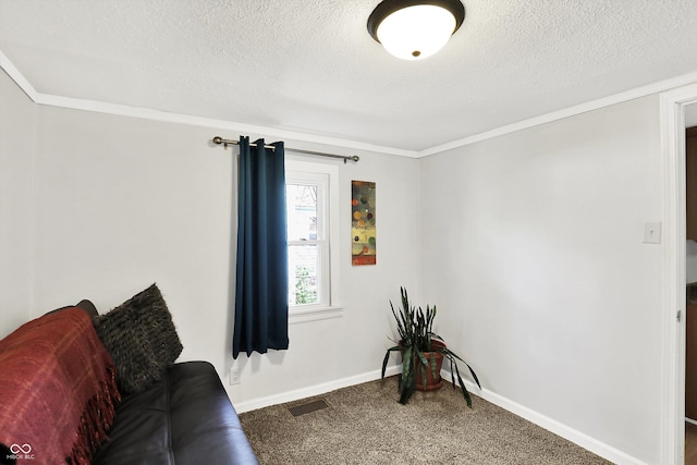 living area featuring carpet flooring, a textured ceiling, visible vents, and crown molding