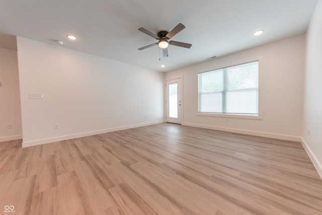 empty room with light wood-type flooring, recessed lighting, baseboards, and ceiling fan