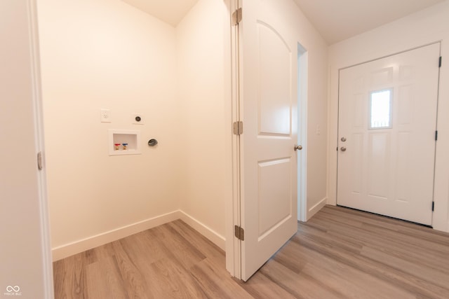laundry area with baseboards, washer hookup, light wood-style floors, laundry area, and electric dryer hookup