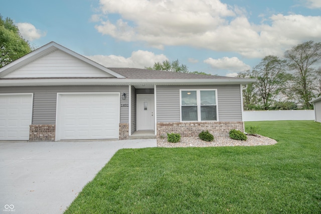 ranch-style home featuring a shingled roof, an attached garage, brick siding, a front yard, and driveway