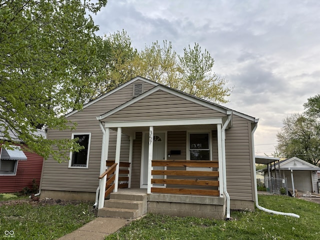 bungalow-style house featuring covered porch