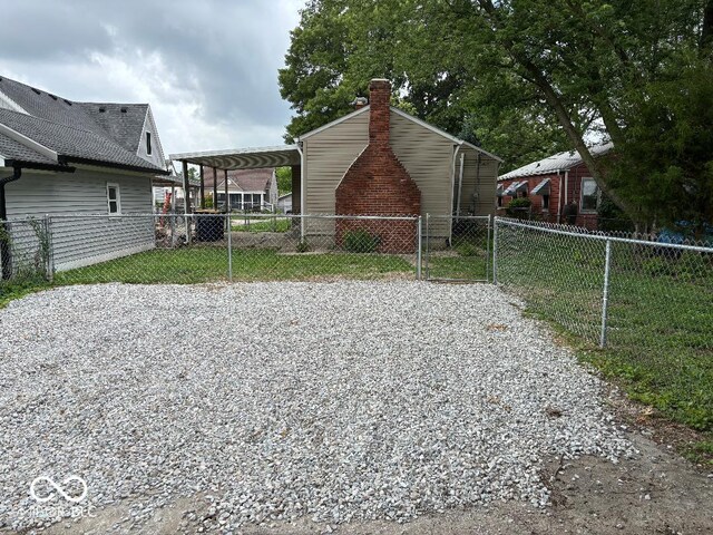 357 N 18th Ave, Beech Grove, IN 46107 - surrounding community featuring driveway, a carport, and a gate