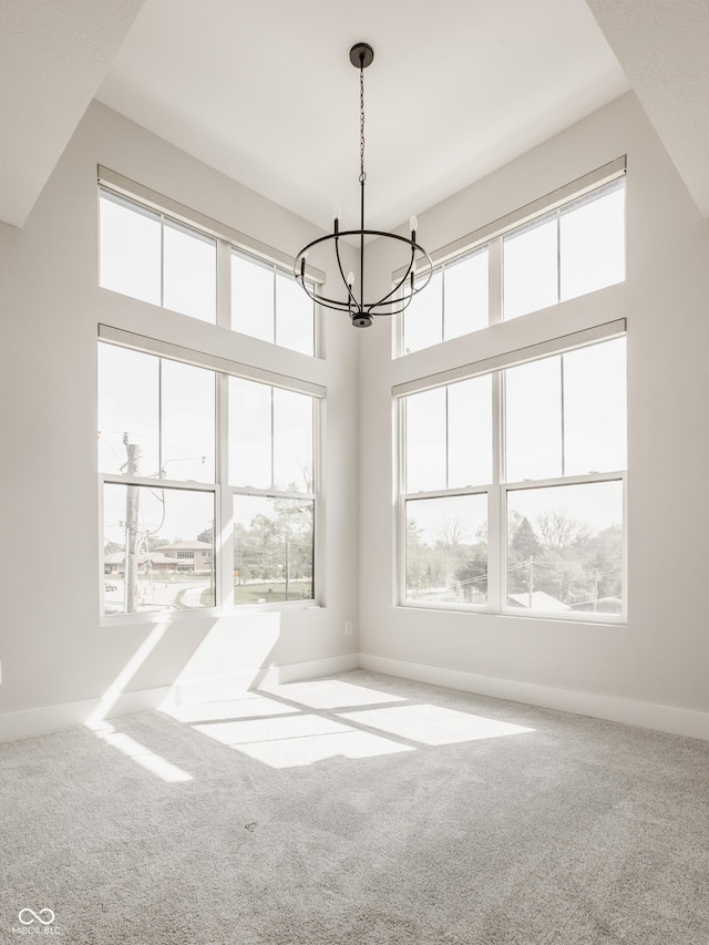 401 Jersey St, Westfield, IN 46074 - interior space featuring baseboards, an inviting chandelier, and a healthy amount of sunlight